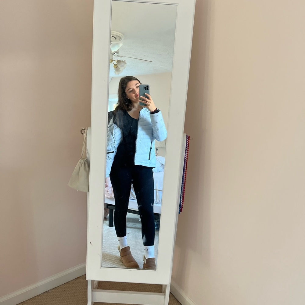 Black long sleeve women’s bodysuit, size small.